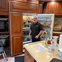 Wilshire Refrigeration & Appliance - One of our technicians on the job!