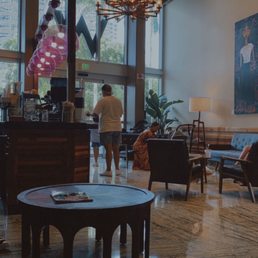 people in the lobby of a hotel