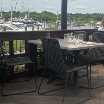 Ketch 22 - Ketch22 outdoor seating with a view of incoming/outgoing boats/yachts. - Seafood Near Me - North Beach, Maryland