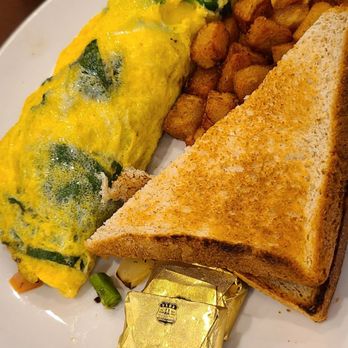 Aloha Kitchen - Omelette with spinach and asparagus. Served with country potatoes and toast. - Breakfast & Brunch Near Me - Honolulu, Hawaii