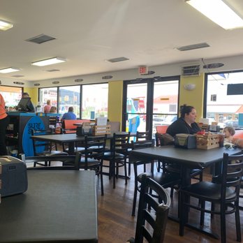 The Break - people sitting at tables in a restaurant - Breakfast & Brunch Near Me - Oak Island, North Carolina