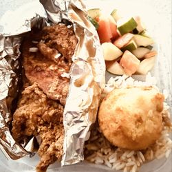 Nana Morrison's Soul Food - Fried Chicken, cucumber salad and white rice with gravy. Cornbread muffin.