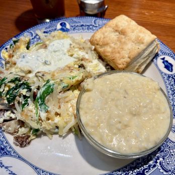 Founding Farmers DC - Chef Joe's Original & I added goat cheese. Cheesy Cheddar Grits & a Buttermilk Biscuit as my sides - American Near Me - Washington, DC, District of Columbia