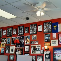 Rudy's Subs - Inside. Wall of sports photos. Many are autographed. The former owner is in a lot of them, too.
