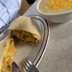 BLT's Breakfast Lunch & Takeout - Breakfast burrito 3 eggs no peppers with a " side " of grits the side portions are huge well worth the money!