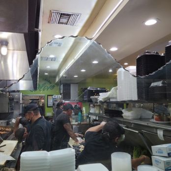 Green Olive - Efficient and visible food prep stations, unfortunately the vents seen above are dirty. - Mediterranean Near Me - Downey, California