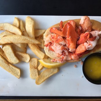 Tides Restaurant & Pub - Just lobster roll with fries - Seafood Near Me - Nahant, Massachusetts Tides Restaurant & Pub - Just lobster roll with fries - Seafood Near Me - Nahant, Massachusetts