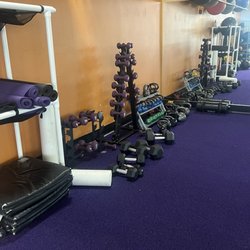 Anytime Fitness - Free lighter weights, not all in great condition. I struggled to find a set of 10's and 15's