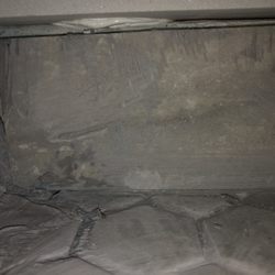 Equity Construction and Design - Backing board showing, not waterproof, mess of grout