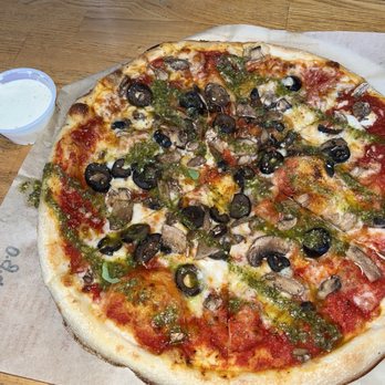 Blaze Pizza - Thin-crust, cheese,  mushroom and black olives topping, with oregano and pesto drizzled on top. With a side of ranch dressing. - Salad Near Me - Niles, Illinois