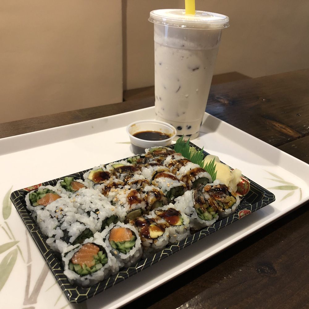 Sushi Spot - Salmon Cucumber, Eel Avocado and Salmon Skin Rolls with a Jasmine Milk Tea - Sushi Bars Near Me - New York, New York Sushi Spot - Salmon Cucumber, Eel Avocado and Salmon Skin Rolls with a Jasmine Milk Tea - Sushi Bars Near Me - New York, New York