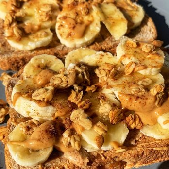 Your Granola Garden - a piece of toast with bananas and peanut butter - Bakeries Near Me - Concord, California Your Granola Garden - a piece of toast with bananas and peanut butter - Bakeries Near Me - Concord, California
