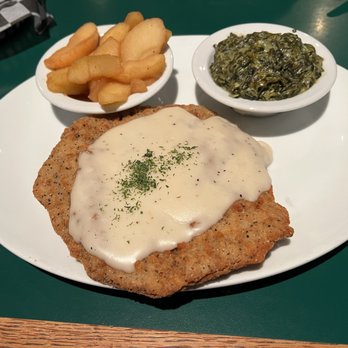 Roasters - Country fried steak with gravy, mashed potatoes (under the steak), cinnamon apples and creamed spinach. - Barbeque Near Me - Sandy Springs, Georgia Roasters - Country fried steak with gravy, mashed potatoes (under the steak), cinnamon apples and creamed spinach. - Barbeque Near Me - Sandy Springs, Georgia