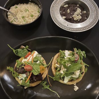 Xochi - Memelas de vegetales dinner entree with family style sides of rice and peas and refried black beans - Mexican Near Me - Houston, Texas Xochi - Memelas de vegetales dinner entree with family style sides of rice and peas and refried black beans - Mexican Near Me - Houston, Texas