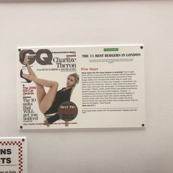 Five Guys - These are the types of images on the walls of this establishment. Owner must have had a fantasy of owning a strip club or being Hugh Hefner. - Burgers Near Me - Selden, New York