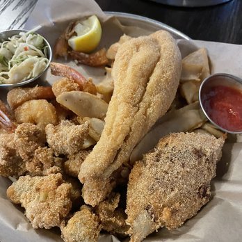 Nectar - Fried fish platter ... shrimp, catfish, crab, oysters, hush puppies. It was so big we shared - Breakfast & Brunch Near Me - Hilton Head Island, South Carolina Nectar - Fried fish platter ... shrimp, catfish, crab, oysters, hush puppies. It was so big we shared - Breakfast & Brunch Near Me - Hilton Head Island, South Carolina