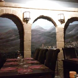 La Olivera - Mural of Nueno pueblo painted on the wall. Comfortable seating, too!!