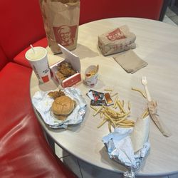 KFC - The Canadian KFC the tenders spicy wrap and a deluxe chicken sandwich and a Mountain Dew and fries