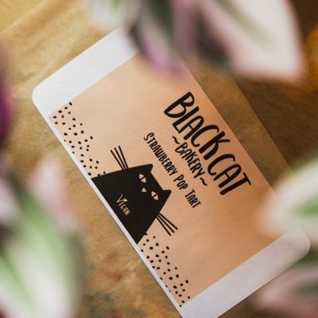 Black Cat Bakery - a black cat on a menu - Bakeries Near Me