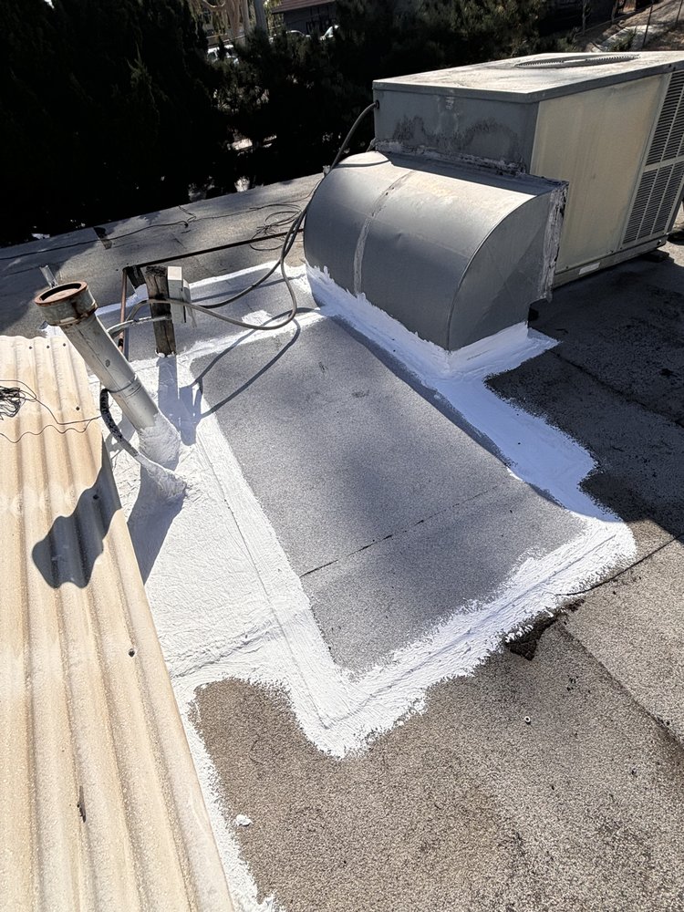 Slide of Troy Construction Roof & Solar