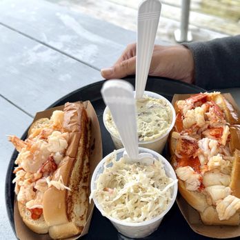 Guilford Lobster Pound - Two warm lobster rolls, coleslaw, and potato salad all made on premises - Seafood Near Me - Guilford, Connecticut