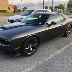 Budget Car Rental - Black DODGE CHALLENGER HEMI.  My last customer said his only complaint was that it was tooooo fast. 972-370-9098
