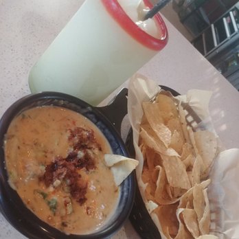 Torchy's Tacos - Rita with queso and chips. - Tacos Near Me - Houston, Texas Torchy's Tacos - Rita with queso and chips. - Tacos Near Me - Houston, Texas