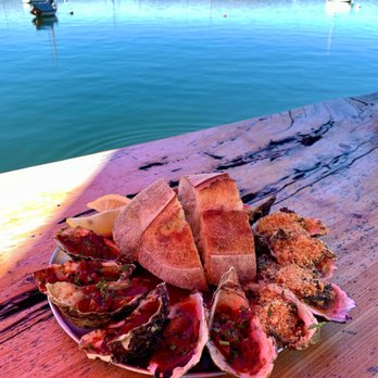The Marshall Store - Oysters Kilpatrick and Rockefeller with two giant hunks of garlicky grilled bread, best enjoyed while taking in the view of Tomales Bay - Seafood Near Me - Marshall, California The Marshall Store - Oysters Kilpatrick and Rockefeller with two giant hunks of garlicky grilled bread, best enjoyed while taking in the view of Tomales Bay - Seafood Near Me - Marshall, California
