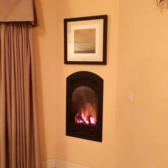 Anderson Inn - The fireplace in one of the premium rooms. Don't touch the glass it gets hot! - Hotels Near Me - Morro Bay, California Anderson Inn - The fireplace in one of the premium rooms. Don't touch the glass it gets hot! - Hotels Near Me - Morro Bay, California