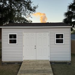 Finish Touch Construction - 12x16 side entrance with French doors and vinyl siding.