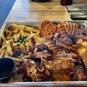 Gettin' Basted - Pulled pork with battered fries and sweet potato fries. - Barbeque Near Me - Branson, Missouri