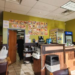 Los Tamales - Dining area and order counter.