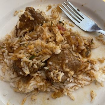 Bombay Deluxe Indian Restaurant - Lamb Curry with rice on plate - Indian Near Me - Anchorage, Alaska Bombay Deluxe Indian Restaurant - Lamb Curry with rice on plate - Indian Near Me - Anchorage, Alaska
