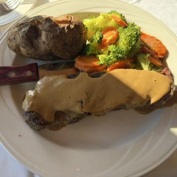 Crow's Nest Restaurant - Angus New York Steak with a baked potato and vegetables - New American Near Me - Santa Cruz, California
