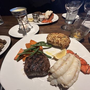 The Keg Steakhouse + Bar - Sirloin and lobster w/mushrooms and twice baked potato. - Bars Near Me - St. John's, Newfoundland and Labrador