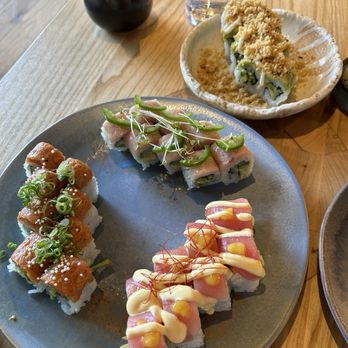 Hello Sunshine - Spicy tuna roll, crispy avocado roll, maui wowie, and chefs roll - Bars Near Me - Banff, Alberta Hello Sunshine - Spicy tuna roll, crispy avocado roll, maui wowie, and chefs roll - Bars Near Me - Banff, Alberta