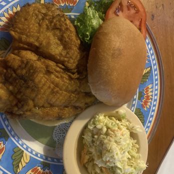 Pineapple Joe's Grill & Raw Bar - Jamaican Jerk fried chicken sandwich with slaw - Cocktail Bars Near Me - Fort Pierce, Florida