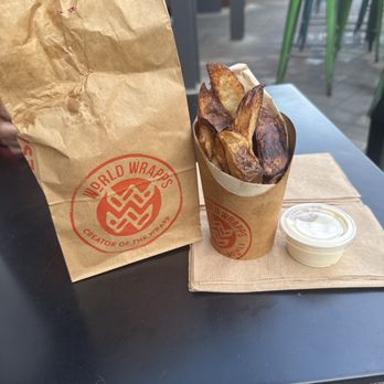 World Wrapps - In this photo, there's the World Fries (wedge cut) w/ a side of garlic aioli - Wraps Near Me - Corte Madera, California World Wrapps - In this photo, there's the World Fries (wedge cut) w/ a side of garlic aioli - Wraps Near Me - Corte Madera, California