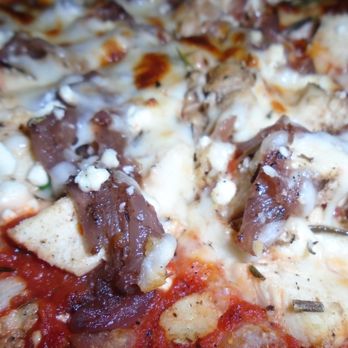 San Pedro Cafe - The Tourist pizza, close-up. - Seafood Near Me - Hudson, Wisconsin