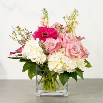 Jenny's Flowers - Bridgette - This sweet arrangement is perfect for a side table or coffee table. It's filled with roses, gerberas hydrangea & stock in vase. - Florists Near Me - Miami, Florida Jenny's Flowers - Bridgette - This sweet arrangement is perfect for a side table or coffee table. It's filled with roses, gerberas hydrangea & stock in vase. - Florists Near Me - Miami, Florida