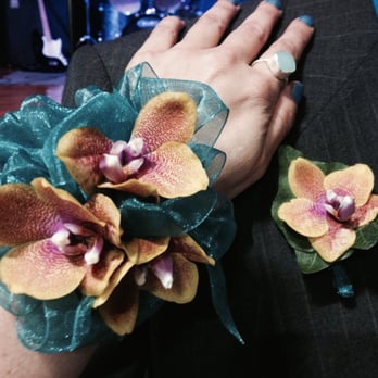 Petalos Floral Design - my fabu super bright corsage and my bf's boutonniere from the fun 80's prom we went to thanks to Petalos.  like totally AWESOME! - Florists Near Me - Kingston, New York