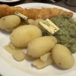 The Swan Restaurant - Fried fillet of cod with new potatoes and mushy peas