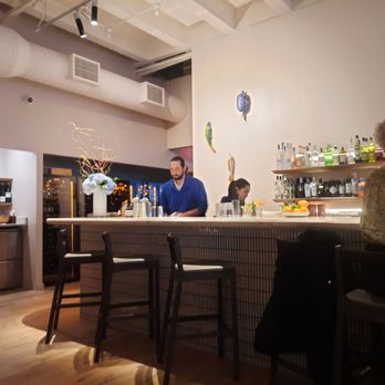 Navy Blue - Near bar, wine cellar in back - Seafood Near Me - Houston, Texas Navy Blue - Near bar, wine cellar in back - Seafood Near Me - Houston, Texas