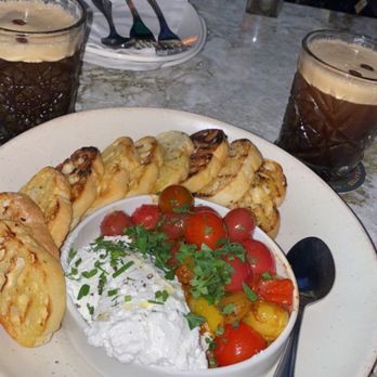 Moxies - Carajillo Drink and Roasted Tomato Bruschetta - Lounges Near Me - Miami, Florida Moxies - Carajillo Drink and Roasted Tomato Bruschetta - Lounges Near Me - Miami, Florida