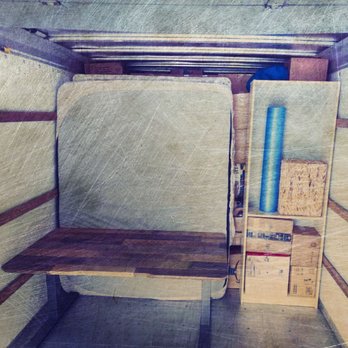 Moving On Up Services - Wall built of secured items in the truck. Ready for safe transport! - Movers Near Me
