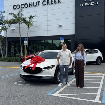Coconut Creek Mazda - New car happy customer - Car Dealers Near Me - Coconut Creek, Florida Coconut Creek Mazda - New car happy customer - Car Dealers Near Me - Coconut Creek, Florida