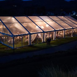 Amazáe Events - Wedding reception in a tent at night