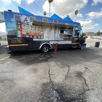 Leos Tacos Truck - a taco truck parked in a parking lot - Tacos Near Me - Wilmington, California Leos Tacos Truck - a taco truck parked in a parking lot - Tacos Near Me - Wilmington, California