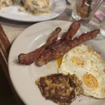 Homesteader - Farmers breakfast with two eggs over easy (or what ever that is) bacon upcharged for 1/2 biscuits and gravy & up charge for crab cake. - New American Near Me - Kansas City, Missouri Homesteader - Farmers breakfast with two eggs over easy (or what ever that is) bacon upcharged for 1/2 biscuits and gravy & up charge for crab cake. - New American Near Me - Kansas City, Missouri