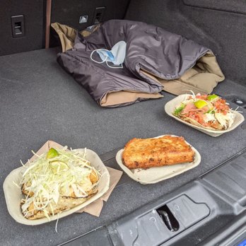 Tacofino - The reality of it, eating out of the back of our trunk. - Mexican Near Me - Tofino, British Columbia Tacofino - The reality of it, eating out of the back of our trunk. - Mexican Near Me - Tofino, British Columbia